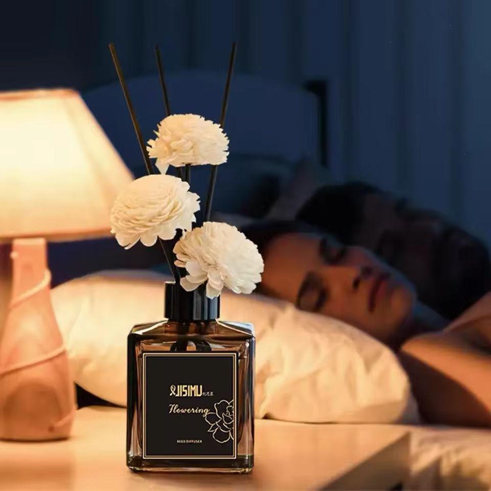 Belle Signature Reed Diffuser 50ml creating a relaxing atmosphere in a luxury bedroom