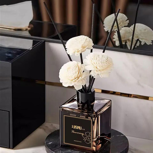 Belle Signature Reed Diffuser 50ml displayed on a marble countertop in a modern luxury bathroom