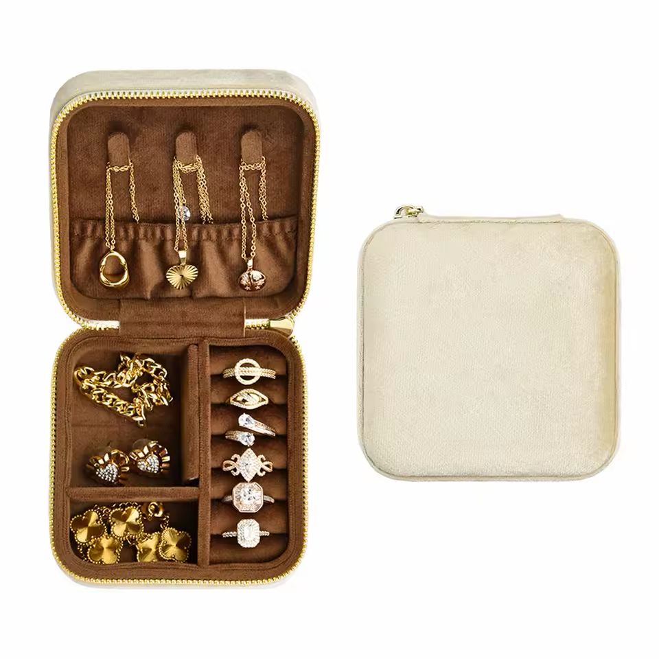 Belle Velvet Jewelry Box in Champagne Beige storing rings, earrings, necklaces and bracelets with organized velvet compartments for travel