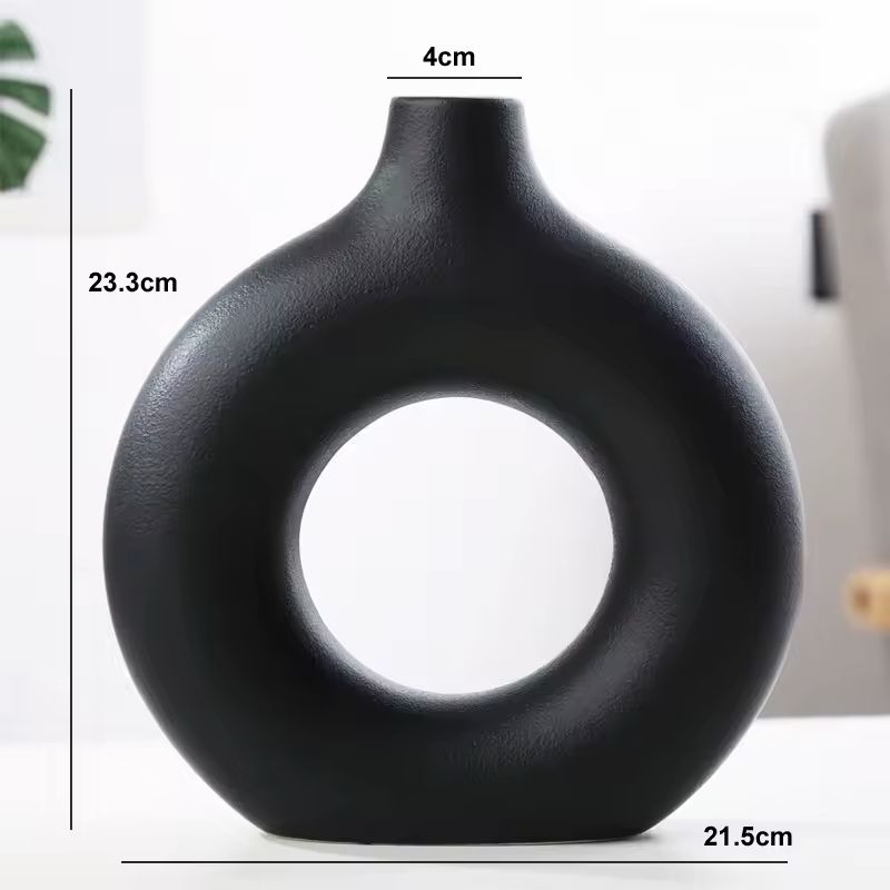 Dimensions of the large black Maison Donut ceramic vase measuring 23.3 cm high and 21.5 cm wide.
