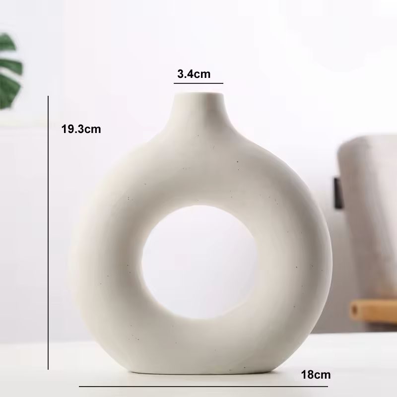 Dimensions of the small white Maison Donut ceramic vase measuring 19.3 cm high and 18 cm wide.