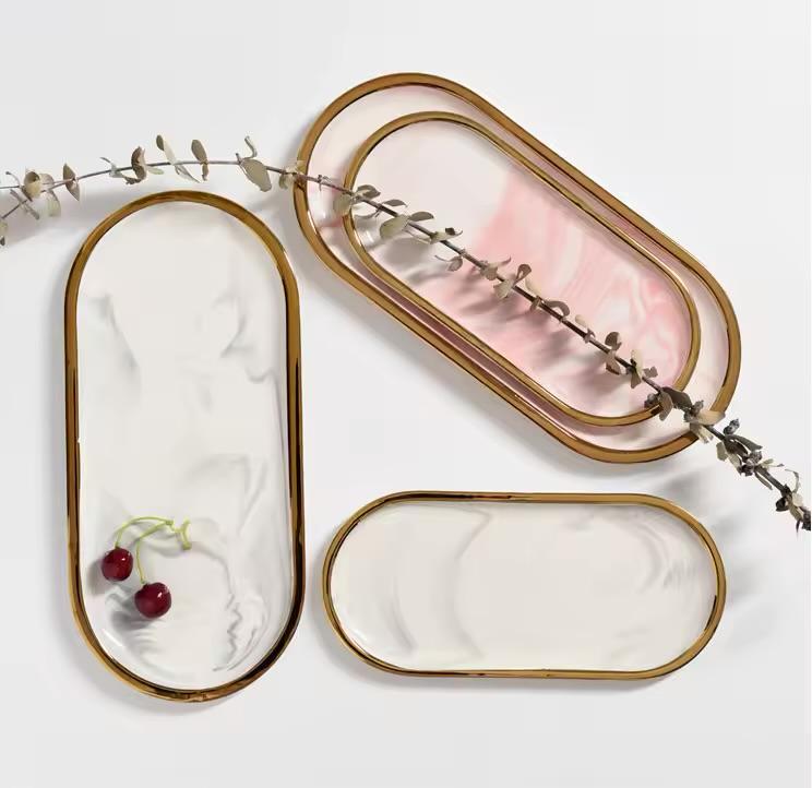 Rosée Marble Tray collection in white and pink marble-effect finishes with elegant gold rim for luxury home décor.
